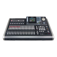 Large audio mixing console with various controls on a white background