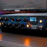 Angled close up view of Tegeler Creme RC Bus Compressor and Mastering Equalizer on desk in studio