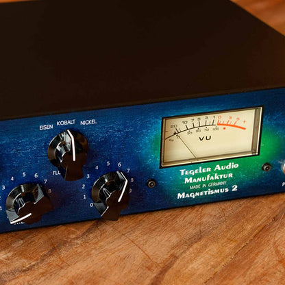 Close up angled front view of Tegeler Magnetismus 2 Transient Shaper & VCA Compressor on wooden surface