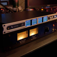 Angled front view of Tegeler Tube Summing Mixer on with another rack effect on top of it in studio