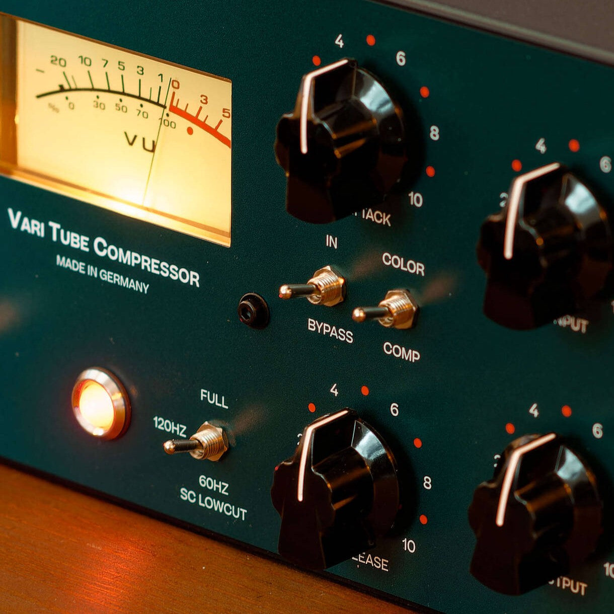 Angled close up view of Tegeler Vari Tube Compressor Vari-Mu Mastering and Bus Compressor on wooden surface