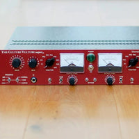 Close up of front of red rackmount effect on top of wooden flooring