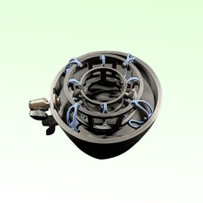 Front view of Tri-Solate USM-3X-1 Universal Shock Mount on green background