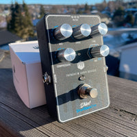 Trondheim Audio Devices SkarBassOne on a Wooden Surface Outdoors