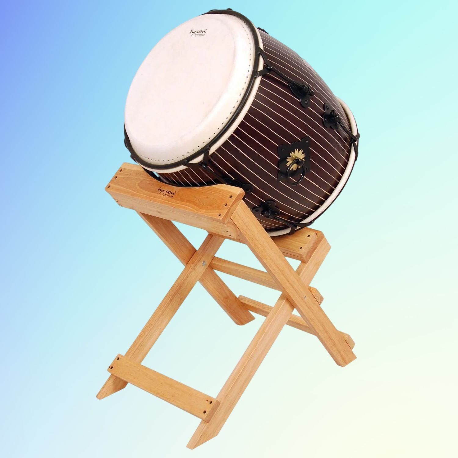 Angled view of Tycoon 16" Nagado Daiko Handcrafted Pinstripe on stand with blue background