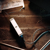 Top view of Universal Audio Apollo e1x Remote-Controllable Unison Preamp on floor of stage during a show