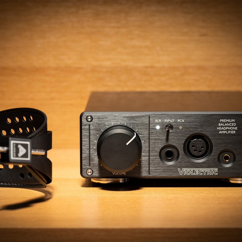 Close up view of Violectric HPA V222 Headphone Amplifier on wooden surface