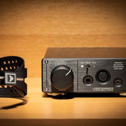 Close up view of Violectric HPA V222 Headphone Amplifier on wooden surface