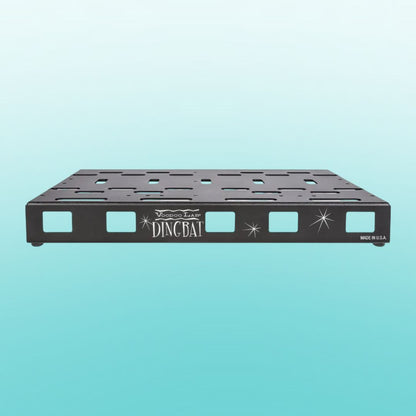 Front view of Voodoo Lab Dingbat Medium on aqua blue background