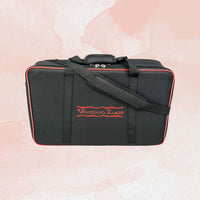 Soft pedalboard case on a pink background