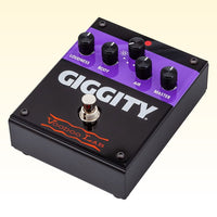 Angled front view of Voodoo Lab GIGGITY Overdrive + Preamp Pedal on yellow background