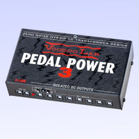 Angled top view of Voodoo Lab Pedal Power 3 on purple background