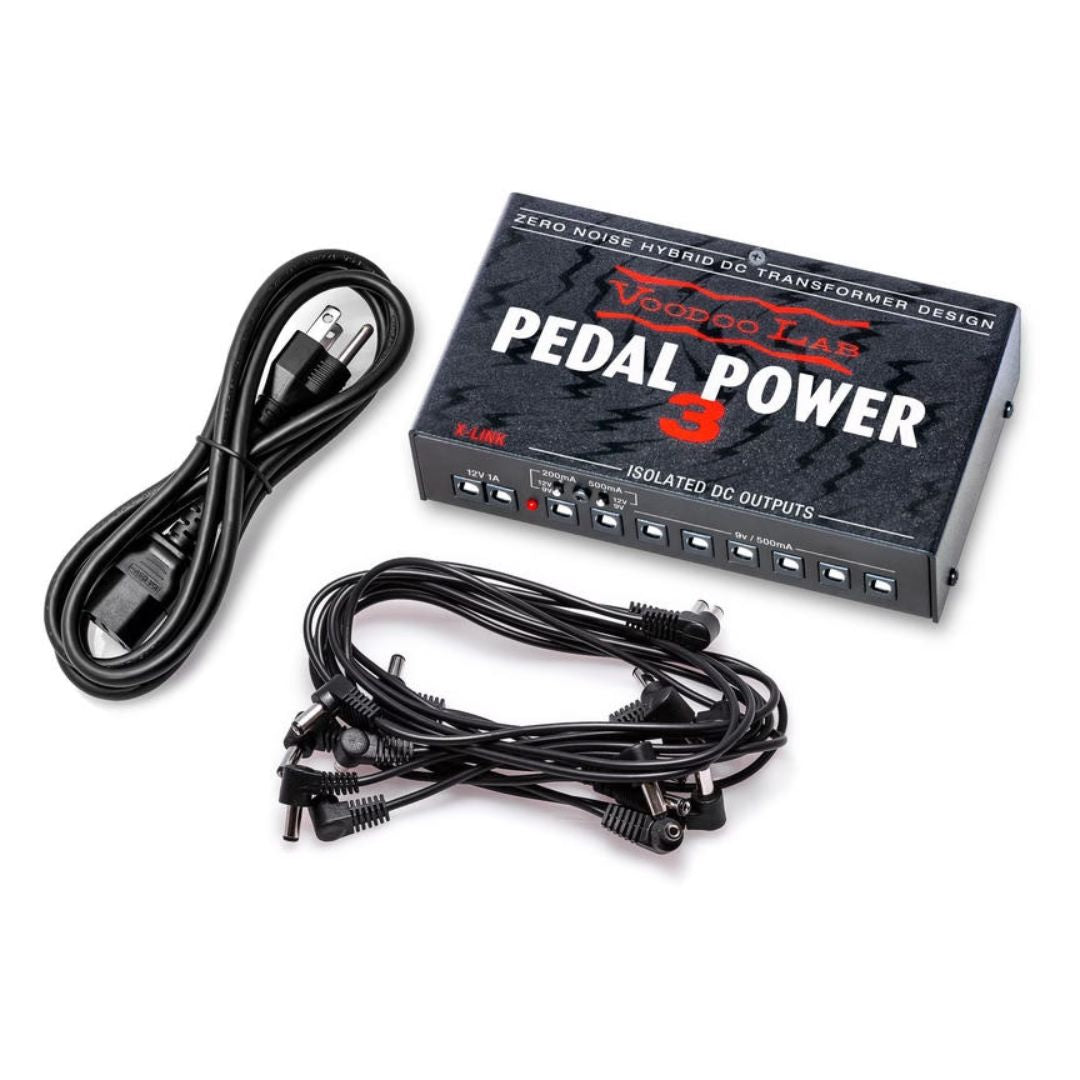 Voodoo Lab Pedal Power 3 with included cables beside it on white background