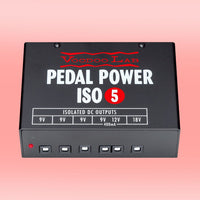 Top view of Voodoo Lab Pedal Power ISO-5 on pink background