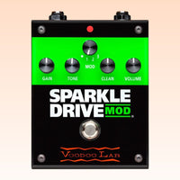 Top view of Voodoo Lab Sparkle Drive MOD Pedal on orange background