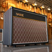 Angled view of Vox AC15 Custom Tube Guitar Amplifier Standard inside music store