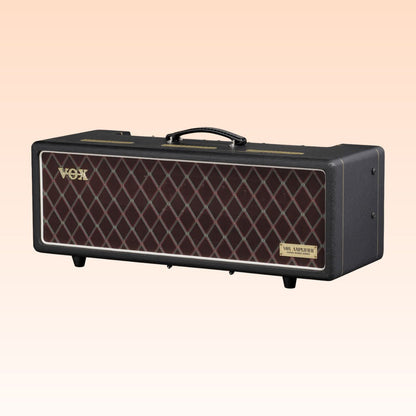 Angled front view of Vox AC30 Hand-Wired Head on orange background