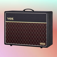Angled front view of Vox AC Hand-Wired 2x12" Cabinet on red gradient background