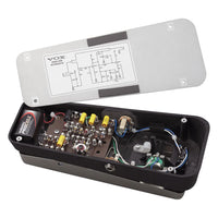 Angled view of Vox V846-HW Hand-Wired Wah Pedal internals with lid on the side on white background