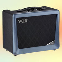 Angled view of Vox VX50GTV Hybrid Modeling Combo Amplifier on yellow orange gradient background