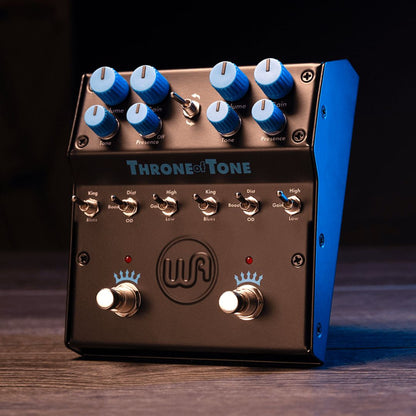 Angled front view of Warm Audio Throne of Tone Dual Overdrive Pedal on wooden surface with dark background