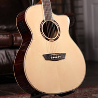Angled close up view of Washburn AG70CE Apprentice Series Acoustic Electric Guitar in studio