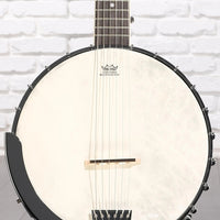 Front view of Washburn B6 Americana 6-String Banjo on white brick background