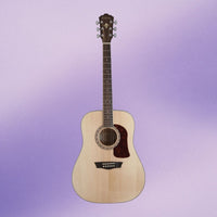 Front view of Washburn D10S Heritage 10 Series Dreadnought Acoustic Guitar on purple background