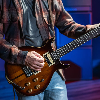 Guitarist playing the Washburn Hawk Electric Guitar Tobacco Sunburst in studio