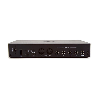 Back view of an electronic device with various ports on a white background